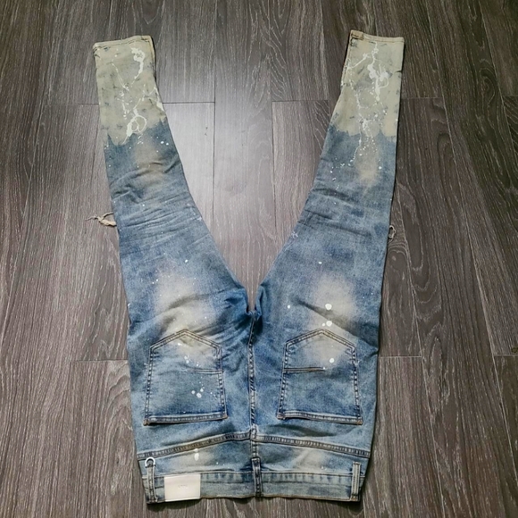 DISTRESSED SLIM JEANS WITH SIDE ZIPPERS ON THE ANKLES. - Picture 2 of 4
